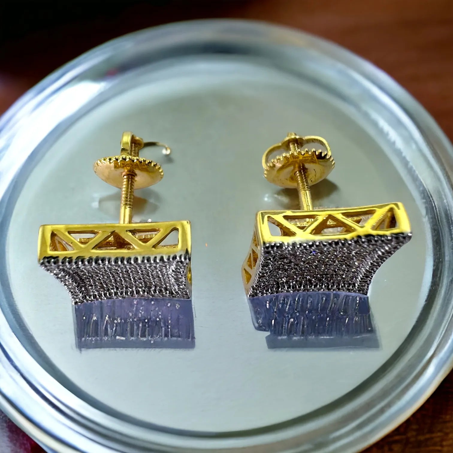 10KT yellow gold square cluster stud earrings with 0.57ct SI diamonds – angled top view showing sparkle and reflection