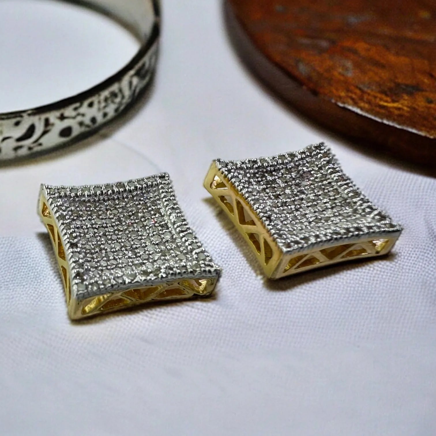 10KT yellow gold square cluster stud earrings with 0.57ct SI diamonds – front view