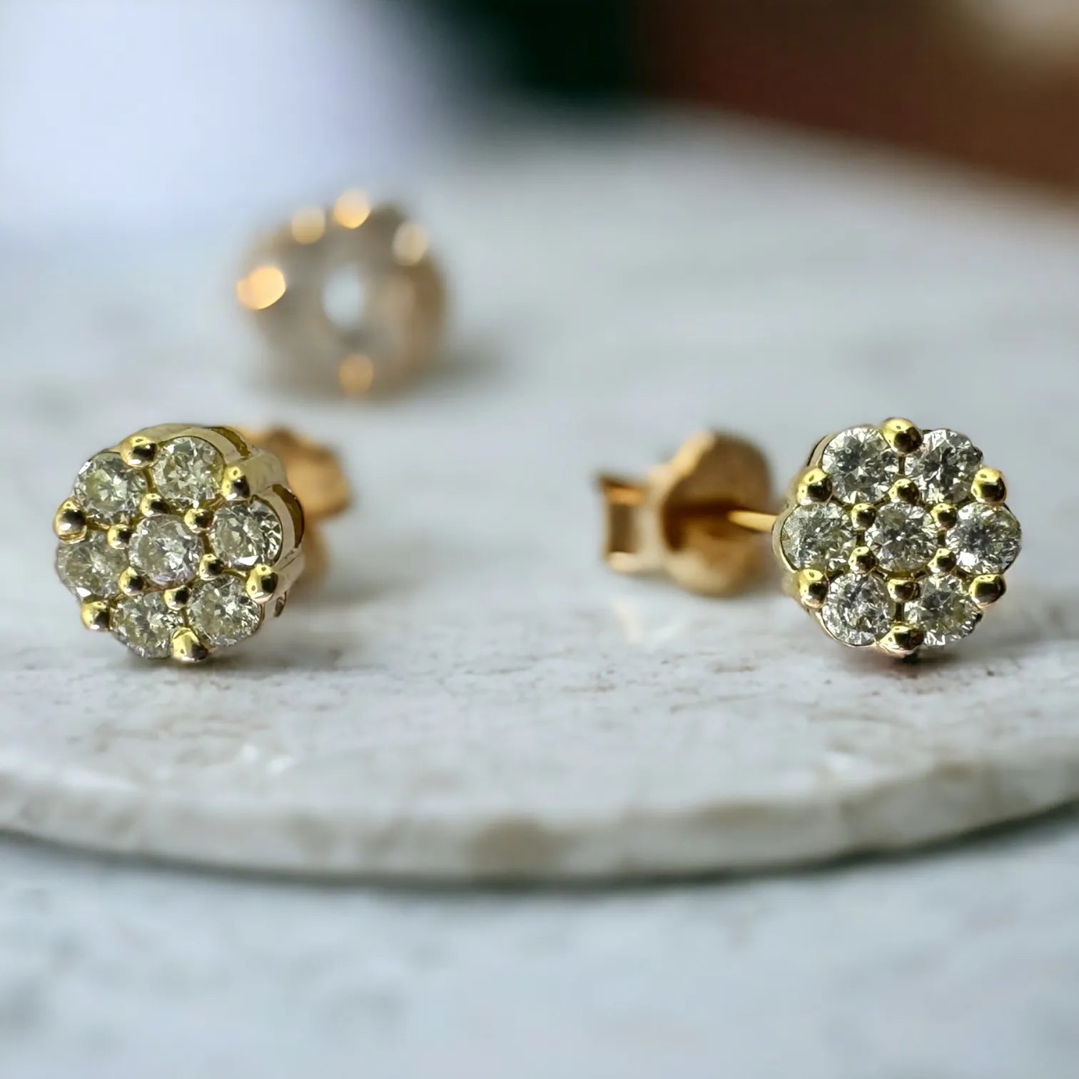 10KT yellow gold diamond flower stud earring 0.25ctw SI clarity, 5mm floral cluster showing secure screw-back post and closure