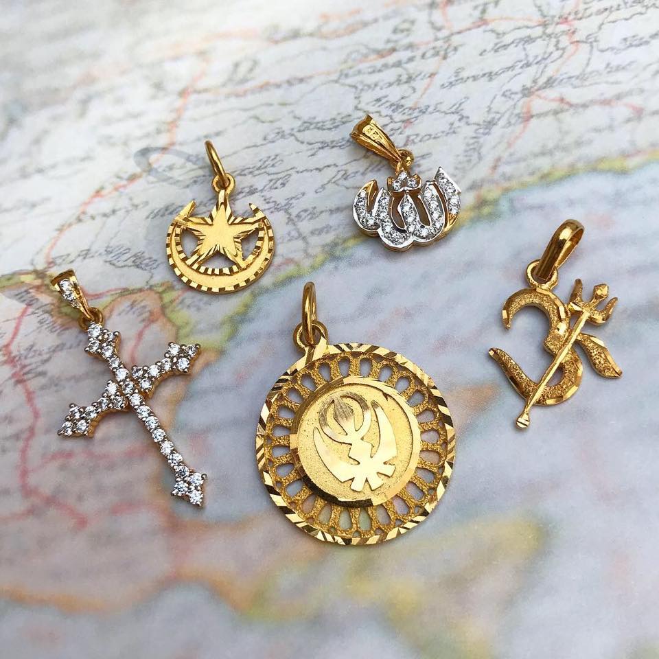 The Meaning Behind Religious Pendants: Saints, Crosses, Virgin Mary & More