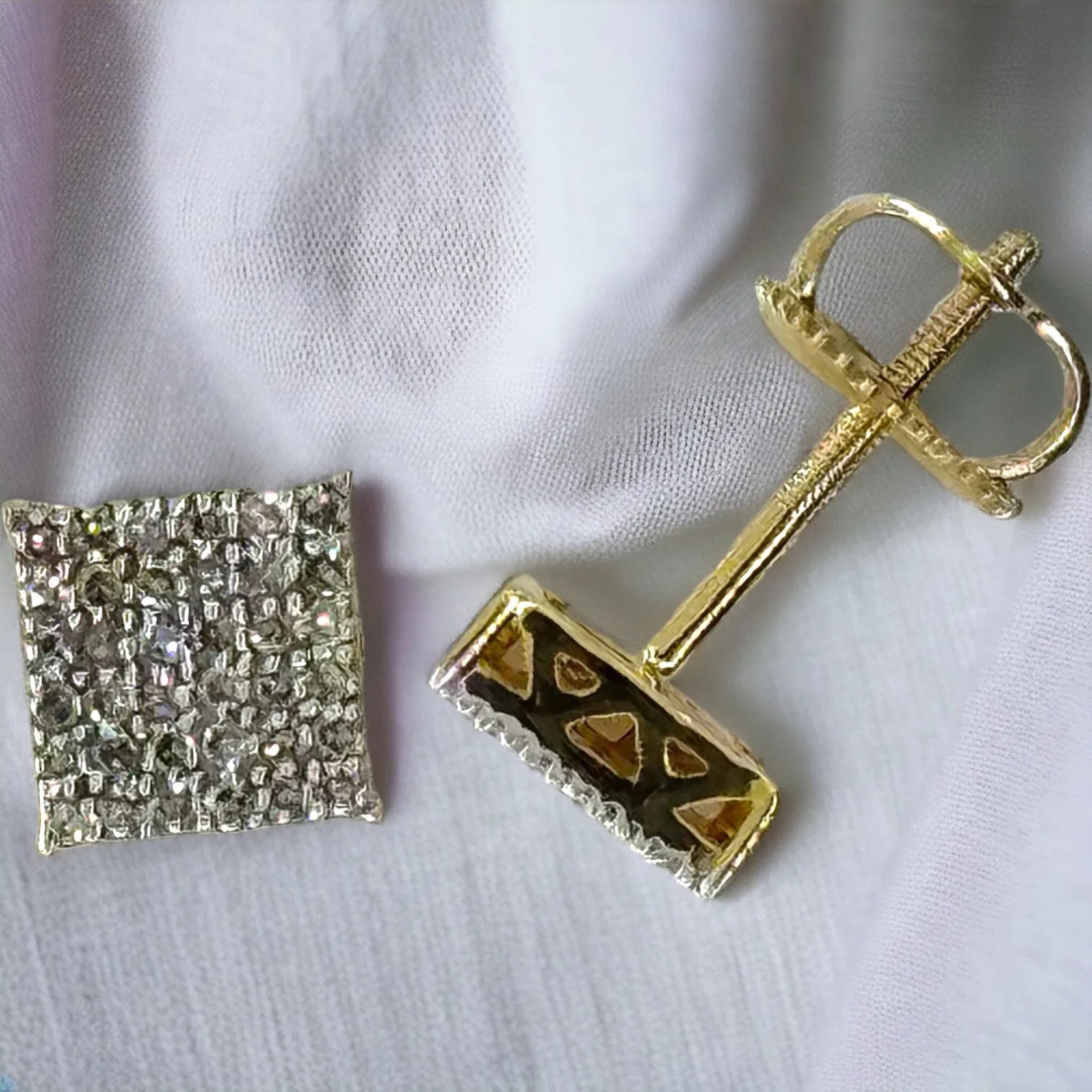 Detailed side and back view of 10KT yellow gold 6mm square diamond stud earrings with 0.28ct SI diamonds, highlighting the secure screw-back posts and open gallery design for maximum brilliance