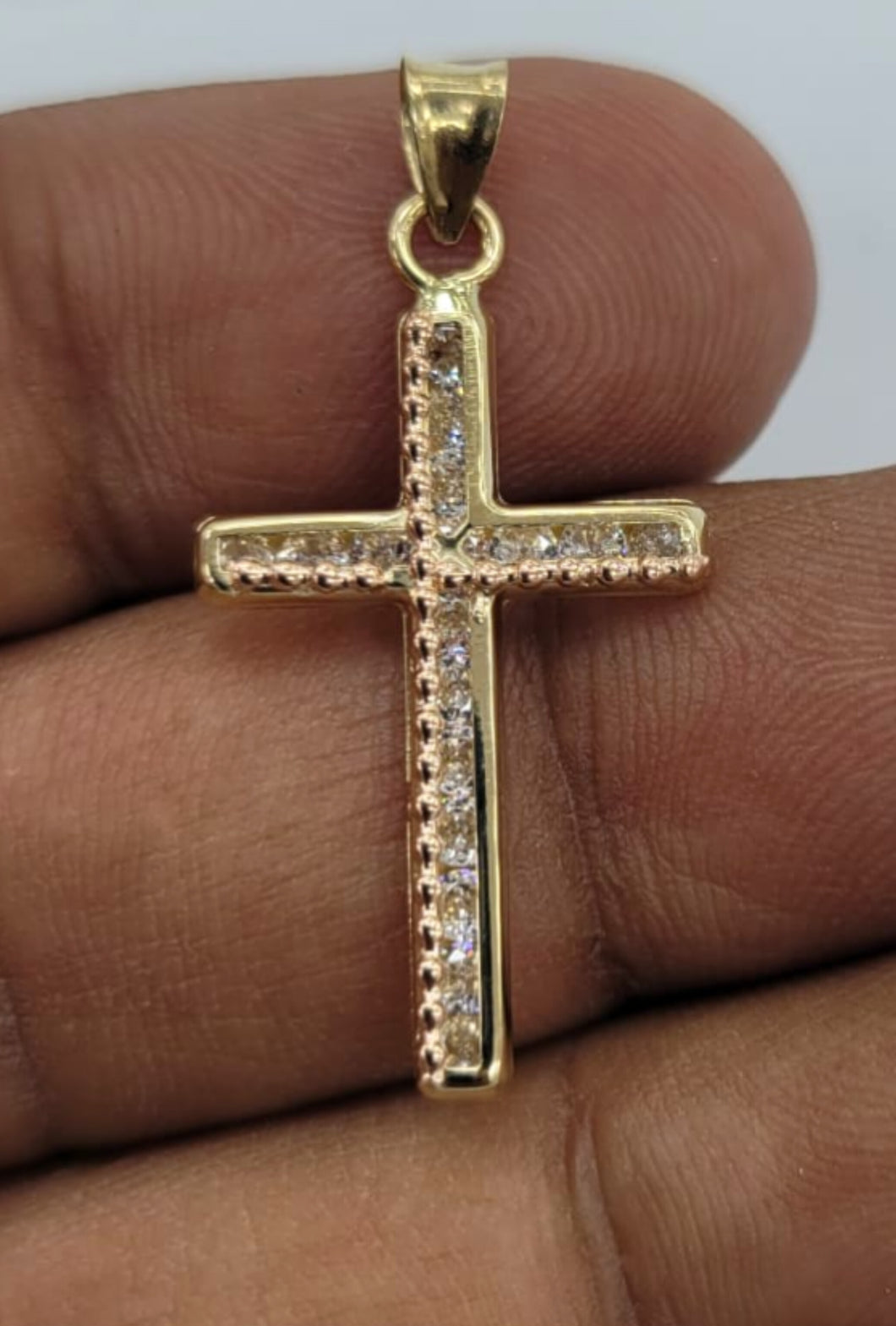 10KT Cross Real Gold pendant ,Diamond cut, 1.06 Grms, 2.5 mm Bail.